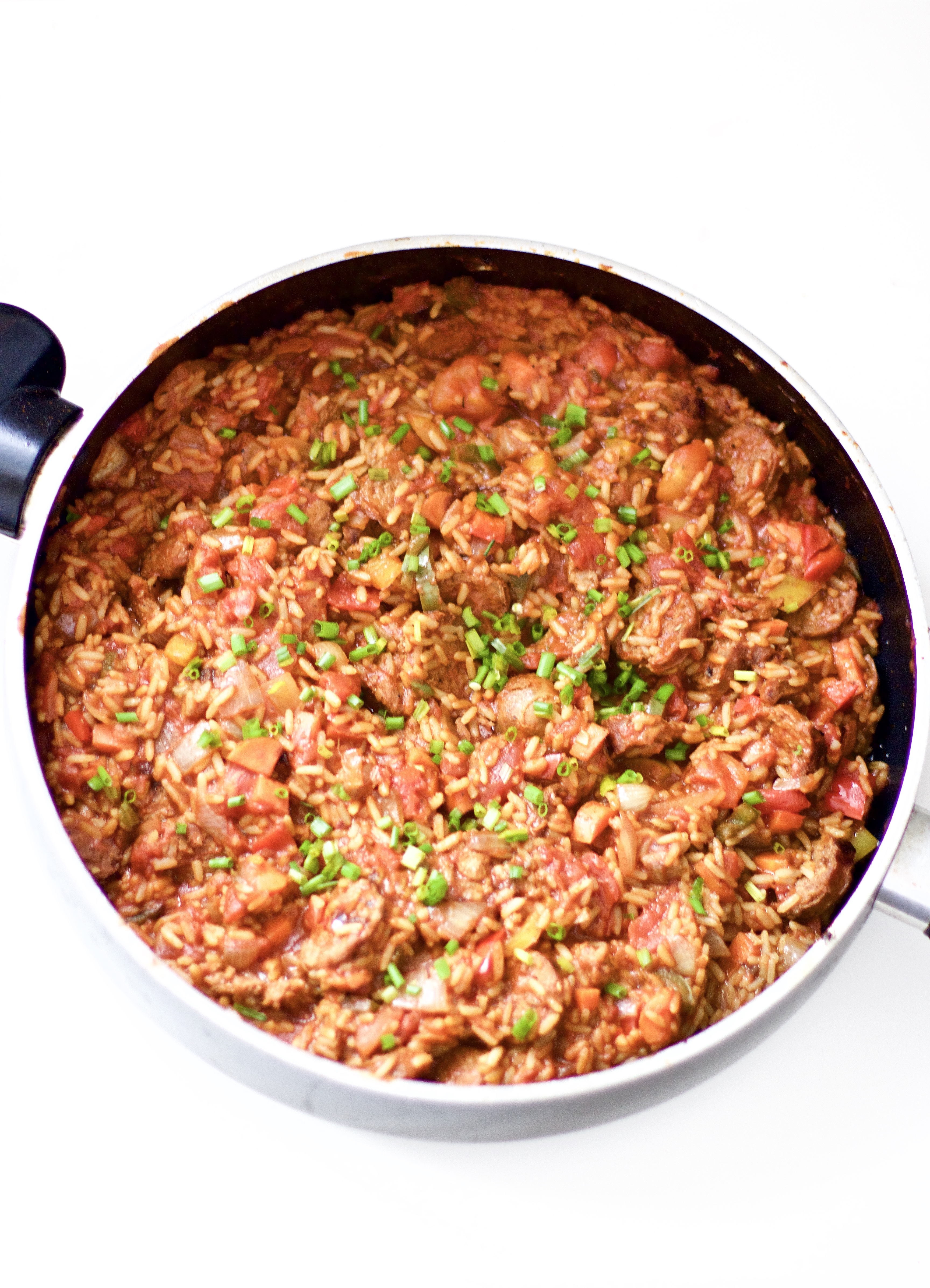 Homemade spicy sausage jambalaya is savoury and mouth watering. An easy and healthy one pot dinner recipe that's perfect for spicy food lovers, easy to cook up and a hearty, wholesome, and gluten-free meal. Family Friendly | Gluten-Free Rice | Main Dish | Dinner Recipe | Southern Dish | Southern Recipes | Cajun | Seasoning | From Scratch | Spicy Sausage | One Pot Meal |