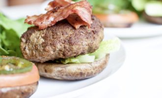 Portobello Mushroom Bacon Burgers are extremely juicy, delicious, and healthy. The ultimate paleo meal that's low in carbs and high in protein.