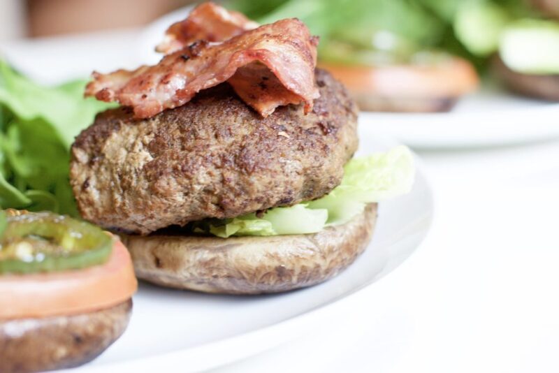 Portobello Mushroom Bacon Burgers are extremely juicy, delicious, and healthy. The ultimate paleo meal that's low carb, keto friendly and high in protein. Gluten Free | No Bread | Homemade Burgers | Gluten-Free Burgers | Keto Burgers | Homemade Hamburgers | Weight Loss | Dinner | BBQ Recipe | Grilling | Grilled Burgers | Bacon Burgers | Paleo | Whole 30 | Sugar Free Ketchup | Bun Replacement | Bread Replacement | Mushrooms | 