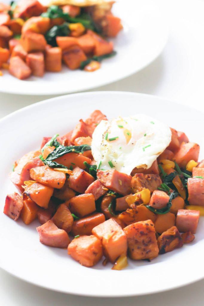 This healthy sweet potato and kielbasa skillet is high in protein and fibre, a hearty whole 30 approved breakfast made in only 20 minutes. One pot | Easy | Paleo Breakfast | Paleo Recipes | Whole 30 Recipes | Uncured Meat | Sugar Free | Non GMO | Gluten-Free | Weight Loss | Low Carb | Low Fat | Brunch | Lunch Recipe | Lunch | Organic | Clean Eating | Breakfast Hash | Filling | Fitness | Wholesome | Crispy | 