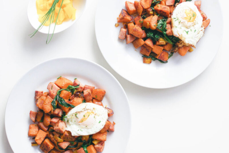 This healthy sweet potato and kielbasa skillet is high in protein and fibre, a hearty whole 30 approved breakfast made in only 20 minutes. One pot | Easy | Paleo Breakfast | Paleo Recipes | Whole 30 Recipes | Uncured Meat | Sugar Free | Non GMO | Gluten-Free | Weight Loss | Low Carb | Low Fat | Brunch | Lunch Recipe | Lunch | Organic | Clean Eating | Breakfast Hash | Filling | Fitness | Wholesome | Crispy | 