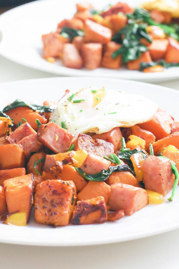 This healthy sweet potato and kielbasa skillet is high in protein and fibre, a hearty whole 30 approved breakfast made in only 20 minutes. One pot | Easy | Paleo Breakfast | Paleo Recipes | Whole 30 Recipes | Uncured Meat | Sugar Free | Non GMO | Gluten-Free | Weight Loss | Low Carb | Low Fat | Brunch | Lunch Recipe | Lunch | Organic | Clean Eating | Breakfast Hash | Filling | Fitness | Wholesome | Crispy | 