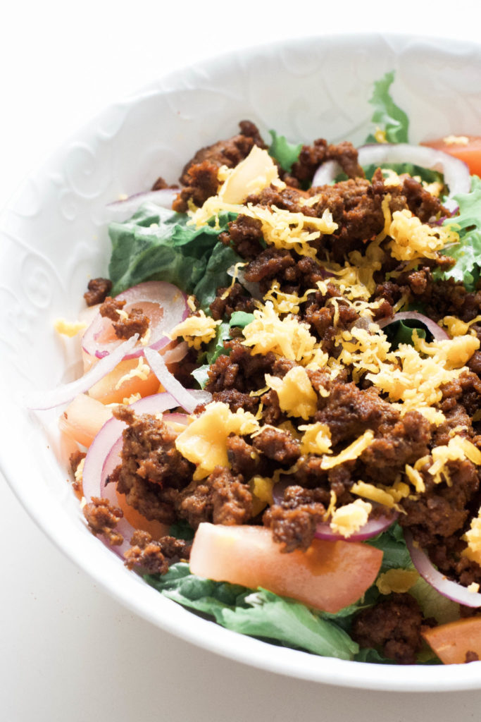 Low carb taco bowls are perfect for weight loss and staying on track. Made with spices from your cupboard, this homemade lunch or dinner recipe is super easy and will satisfy cravings guilt-free! Fitness Meals | Quick Recipes | Easy Dinner Recipes | Healthy Lunch Recipes | Wholesome | Taco Seasoning | Salad | Taco Salad | Taco Salads | Gluten-Free Tacos | High Protein | Cooking with Spices | Healthy Salad | Mexican Food | From Scratch | Keto Tacos | Keto Diet | Ketogenic |