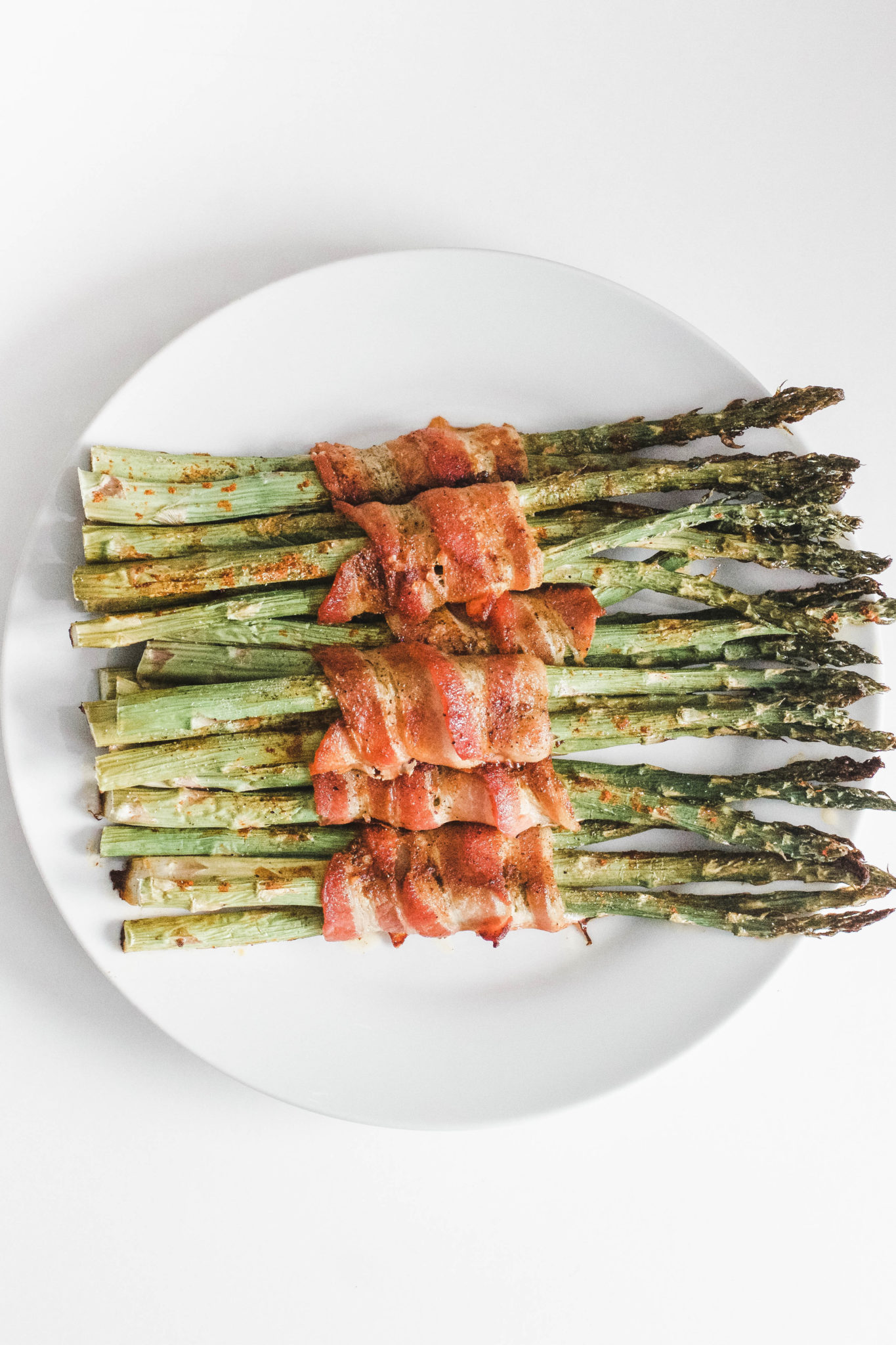 Bacon Wrapped Asparagus is the perfect side dish at dinnertime. Great for lunch or meal prepping as well. They're full of flavour and only 20 minutes to make! Brakfast | Lunch | Dinner | Sides | Side Dish | Uncured Bacon | Organic | NON GMO | Paleo | Whole 30 | Gluten-free | GF | Easy | Quick | Vegetables | Veggies | Keto | Ketogenic Diet | Weight Loss | Lose Weight | Low Carb | Protein | 