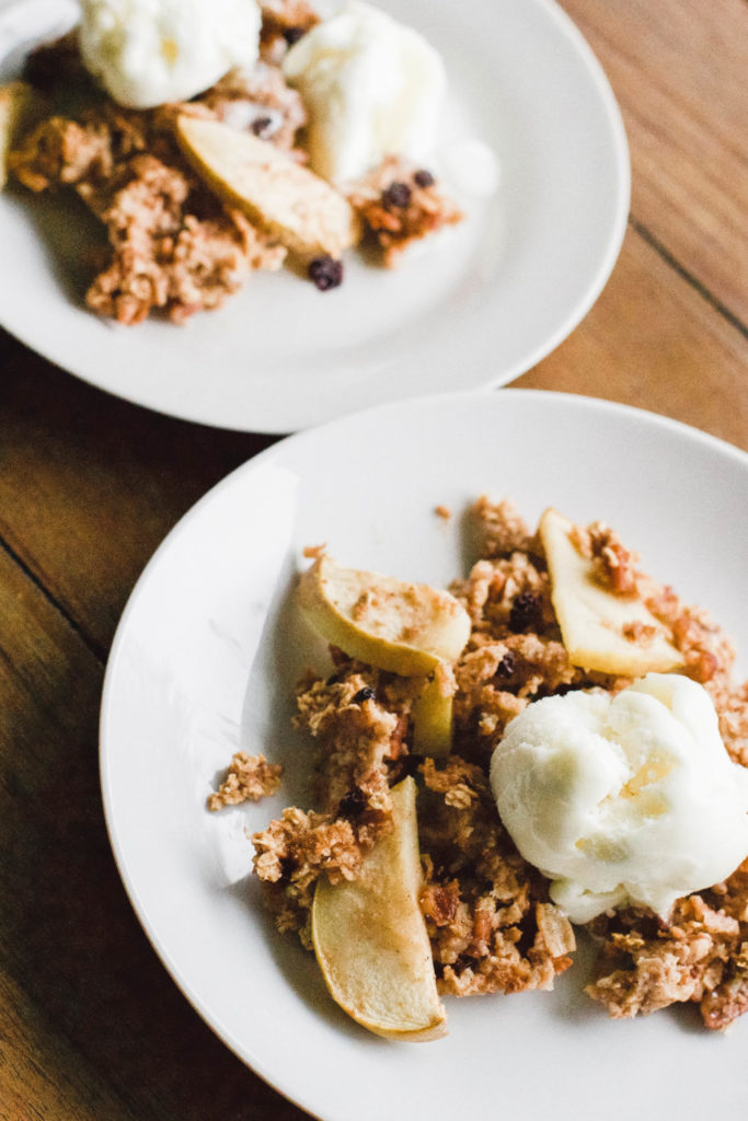 Baked Oatmeal Apple Crisp is a one pan dish - simply mix ingredients, bake, and serve as a dessert or a healthy, wholesome morning breakfast. Gluten-free, vegan and refined sugar free!