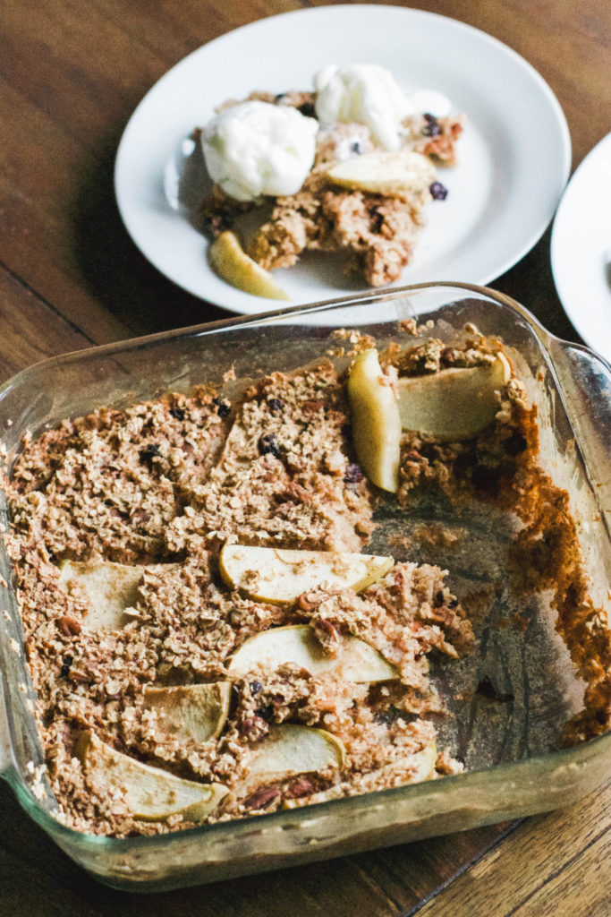 Baked Oatmeal Apple Crisp is a one pan dish - simply mix ingredients, bake, and serve as a dessert or a healthy, wholesome morning breakfast. Gluten-free, vegan and refined sugar free! Fall Desserts | Fall Recipes | Granny Smith Apples | Healthy | Dessert for Breakfast | Plant Based | Ice cream | Autumn | Cinnamon | Easy Recipes | Sweets | Dessert Food | Baked Oatmeal | Gluten-free Oats | Breakfast | Healthy