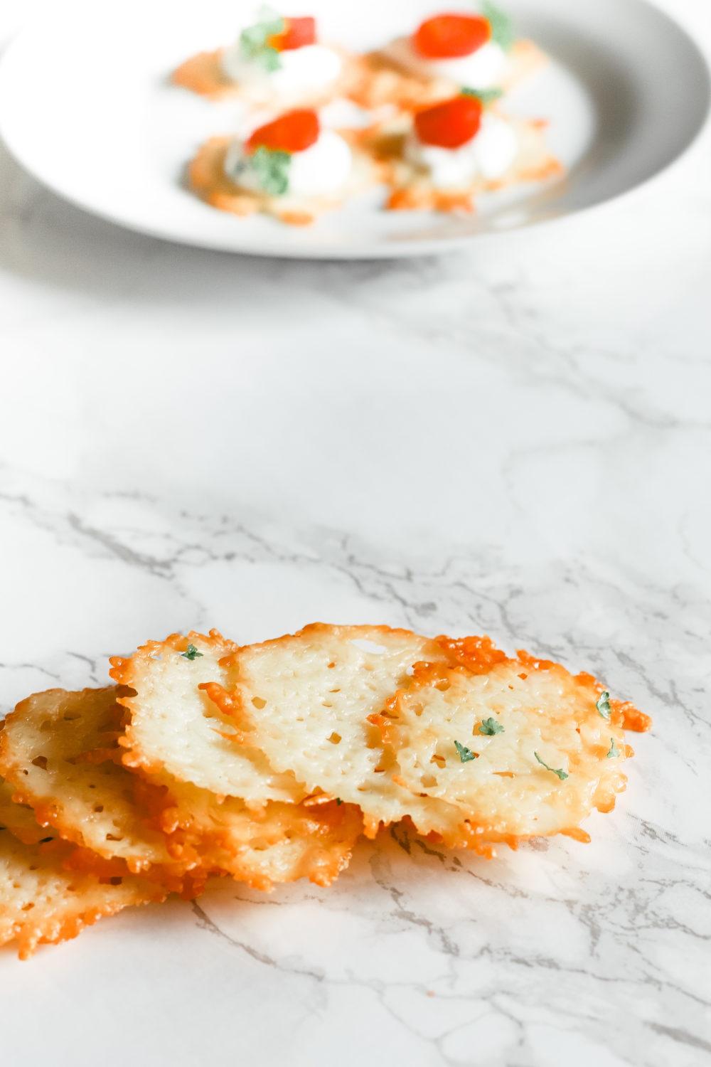 These parmesan chips replace your guilty pleasure while keeping you in ketosis. They're gluten free, low carb, and ketogenic friendly - only 5 minutes to make! Parmesan Crips | Keto Chips | Keto snacks | Weight Loss | Atkins Diet | Keto Diet | Easy Low Carb Snacks | Appetizers | Christmas Recipe | Holiday Appetizer | Oven Baked | 