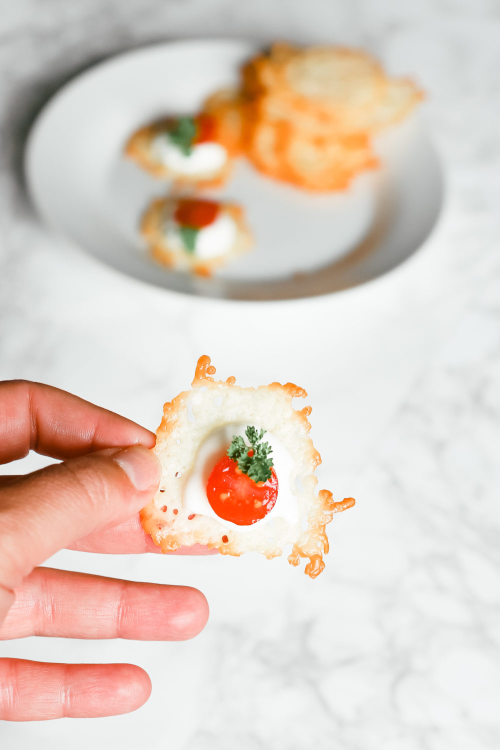 These parmesan chips replace your guilty pleasure while keeping you in ketosis. They're gluten free, low carb, and ketogenic friendly - only 5 minutes to make! Parmesan Crips | Keto Chips | Keto snacks | Weight Loss | Atkins Diet | Keto Diet | Easy Low Carb Snacks | Appetizers | Christmas Recipe | Holiday Appetizer | Oven Baked | 