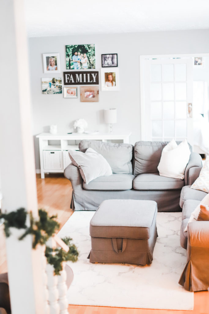 This is our living room home tour with minimal, cozy, and affordable Christmas decorations for the holiday season. I'll be linking everything from our rug, furniture, and accents, to our Christmas tree and electric fireplace. Home Design | Home Decor | Christmas Decor | Christmas Decorations | Deck The Halls | Holiday Decorating | Xmas Tree | Ikea Ektorp Sofa | Nordvalla Grey | Hemnes Sofa Table | TV on Top of Fireplace | Mantel |