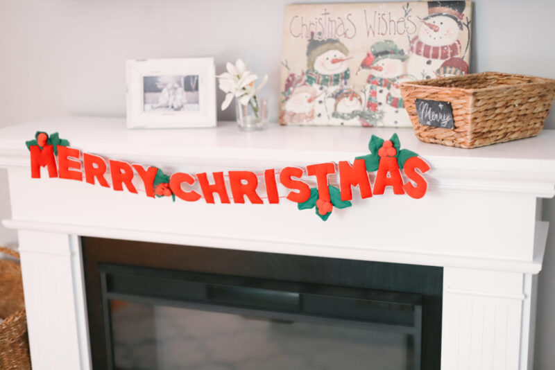 This is our living room home tour with minimal, cozy, and affordable Christmas decorations for the holiday season. I'll be linking everything from our rug, furniture, and accents, to our Christmas tree and electric fireplace. Home Design | Home Decor | Christmas Decor | Christmas Decorations | Deck The Halls | Holiday Decorating | Xmas Tree | Ikea Ektorp Sofa | Nordvalla Grey | Hemnes Sofa Table | TV on Top of Fireplace | Mantel |