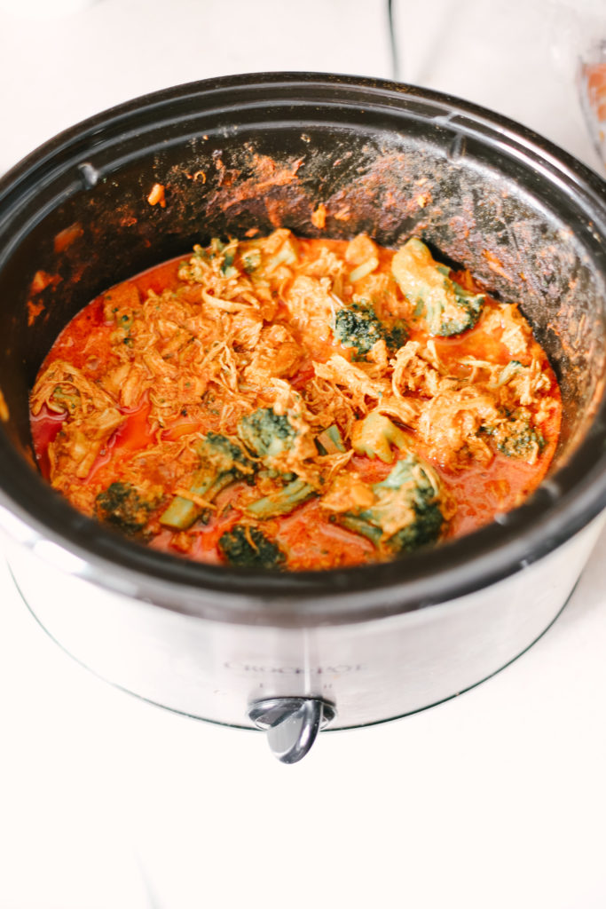 Homemade Slow Cooker Butter Chicken on top of cauliflower rice is sugar free, grain free, dairy free, and low carb. Powerful ingredients for optimal health and weight loss. Keto Butter Chicken | Dinner | Entrees | Slow Cooker | Crock Pot | Indian Cuisine | Healthy | Weight Loss | Ketogenic | Gluten-Free | Whole 30 | Paleo | Kid Friendly | Homemade | Butter Chicken Sauce | Family Dinner | Easy Slow Cooker Recipe | Broccoli and Chicken | Entree Dish |