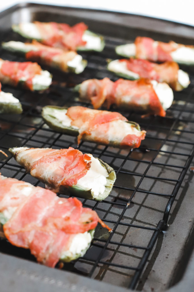 Keto bacon wrapped, cream cheese stuffed jalapeños are quick and easy to make, baked in the oven to perfection! A gluten-free, low carb snack or appetizer. Mexican Food | Keto Jalapenos | Stuffed Jalapenos | Keto Jalapeno Poppers | Bacon Wrapped Jalapenos | Weight Loss | Ketogenic | Ketos Snacks | Keto Recipes | Baked Jalapenos | Easy Keto |