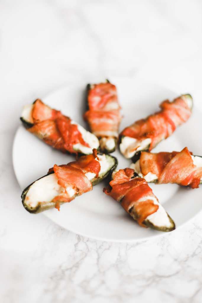 Keto bacon wrapped, cream cheese stuffed jalapeños are quick and easy to make, baked in the oven to perfection! A gluten-free, low carb snack or appetizer. Mexican Food | Keto Jalapenos | Stuffed Jalapenos | Keto Jalapeno Poppers | Bacon Wrapped Jalapenos | Weight Loss | Ketogenic | Ketos Snacks | Keto Recipes | Baked Jalapenos | Easy Keto |