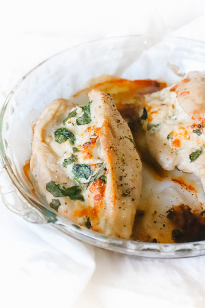 Spinach and cream cheese stuffed chicken is an easy dinner recipe that's gluten-free, low carb and keto friendly! Oven baked, simple and deliciously seasoned. Keto Dinner Recipes | Easy Chicken Recipe | Low Carb | Ketogenic | Gluten-Free | Baked Stuffed Chicken | Spinach Stuffed Chicken | Stuffed Chicken Breasts | Baked Stuffed Chicken | Main Course | Weight Loss | Seasoned Chicken | Filling | Pocket |