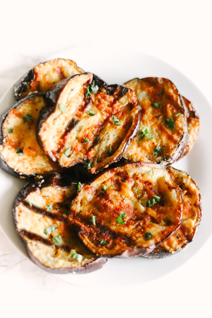 Garlic Parmesan Grilled Eggplant is melt-in-your-mouth delicious, the best BBQ recipe and side dish you will ever make! Easy, healthy, low carb, and keto friendly. Healthy Side Dishes | Dinner Recipes | BBQ Recipes | Eggplant Recipes | Grilling | Sides | BBQ'd Eggplant | Ketogenic | Weight Loss | Keto Dinner | Easy | Simple | Grilled Veggies | Barbecue | Barbecued | 