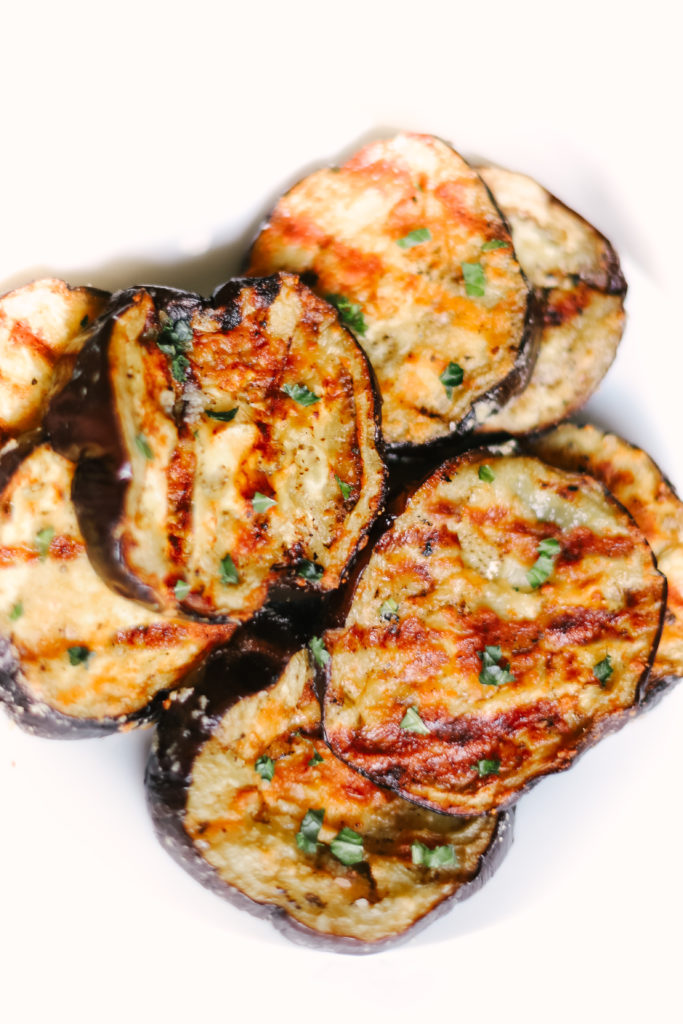 Garlic Parmesan Grilled Eggplant is melt-in-your-mouth delicious, the best BBQ recipe and side dish you will ever make! Easy, healthy, low carb, and keto friendly. Healthy Side Dishes | Dinner Recipes | BBQ Recipes | Eggplant Recipes | Grilling | Sides | BBQ'd Eggplant | Ketogenic | Weight Loss | Keto Dinner | Easy | Simple | Grilled Veggies | Barbecue | Barbecued | 