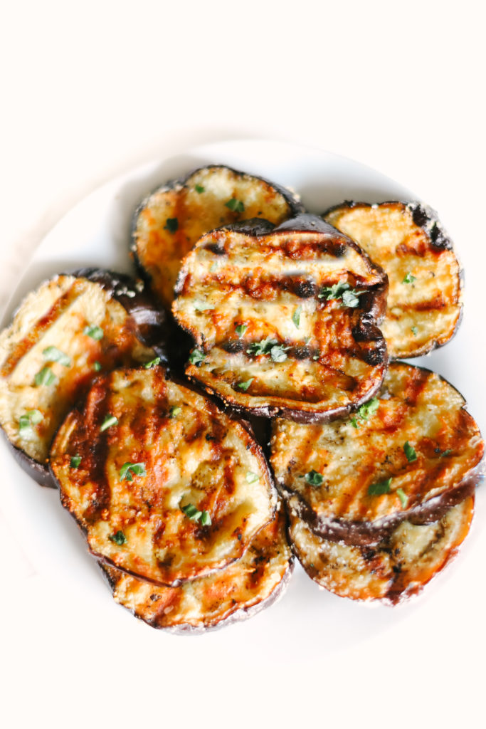 Garlic Parmesan Grilled Eggplant is melt-in-your-mouth delicious, the best BBQ recipe and side dish you will ever make! Easy, healthy, low carb, and keto friendly. Healthy Side Dishes | Dinner Recipes | BBQ Recipes | Eggplant Recipes | Grilling | Sides | BBQ'd Eggplant | Ketogenic | Weight Loss | Keto Dinner | Easy | Simple | Grilled Veggies | Barbecue | Barbecued | 