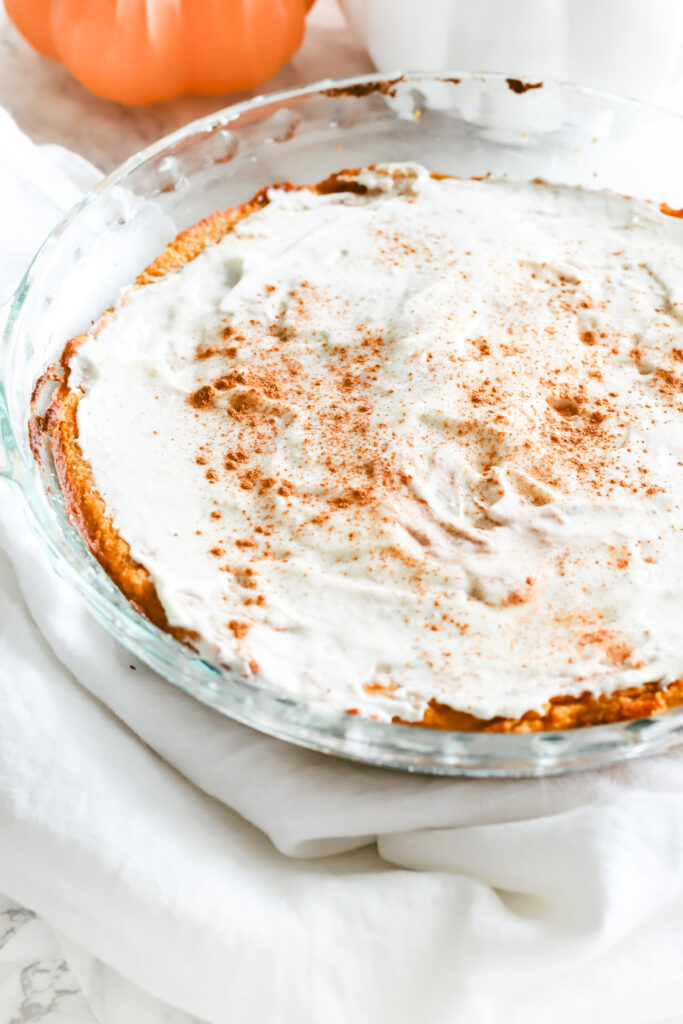 This pumpkin pie cake is just like the real thing, except homemade, healthy, and refined sugar free. The most scrumptious low carb and keto dessert for fall and Thanksgiving. Pumpkin Spice | Fall Recipes | Fall Desserts | Pumpkin Pie Dessert | Sugar Free | Gluten-Free | Autumn | Halloween | Thanksgiving | Pumpkin Cake | Snack | Healthy | Weight Loss | Ketogenic | Keto Pumpkin Recipe | Low Carbs | Crustless Pie |