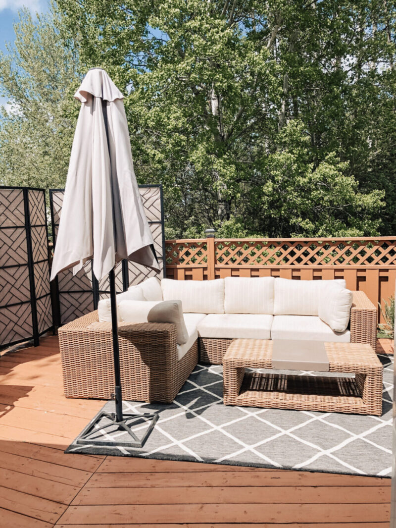 Tips for deck or patio decor and design for the ultimate outdoor oasis! Our deck renovation before and after transformation using solid stain. Solid Deck Stain | Wood Stain | Deck Staining | Deck Renovation | Patio Furniture | Deck Design | Privacy Fence | Privacy Screen | Patio Decor | Outdoor Living | Backyard Space | Outdoor Decor | Tofino Sectional Canvas Collection | Olympic Timberline Wood Stain