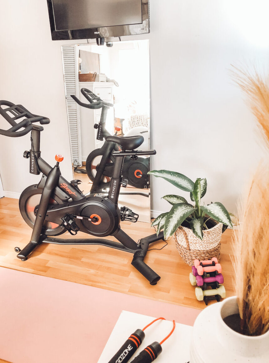 Home gym reveal, perfect for small spaces! Affordable fitness equipment and decor must haves inspiring you to reach your health goals! exercise equipment | fitness | home gym | home gym ideas | home gym reveal | peloton dupe | peloton alternative | small spaces | diy | home decor | gym decor | echelon bike | exercise bike | home workout | amazon | walmart | healthy living | weight loss | small gym space | spin bike | gozone 