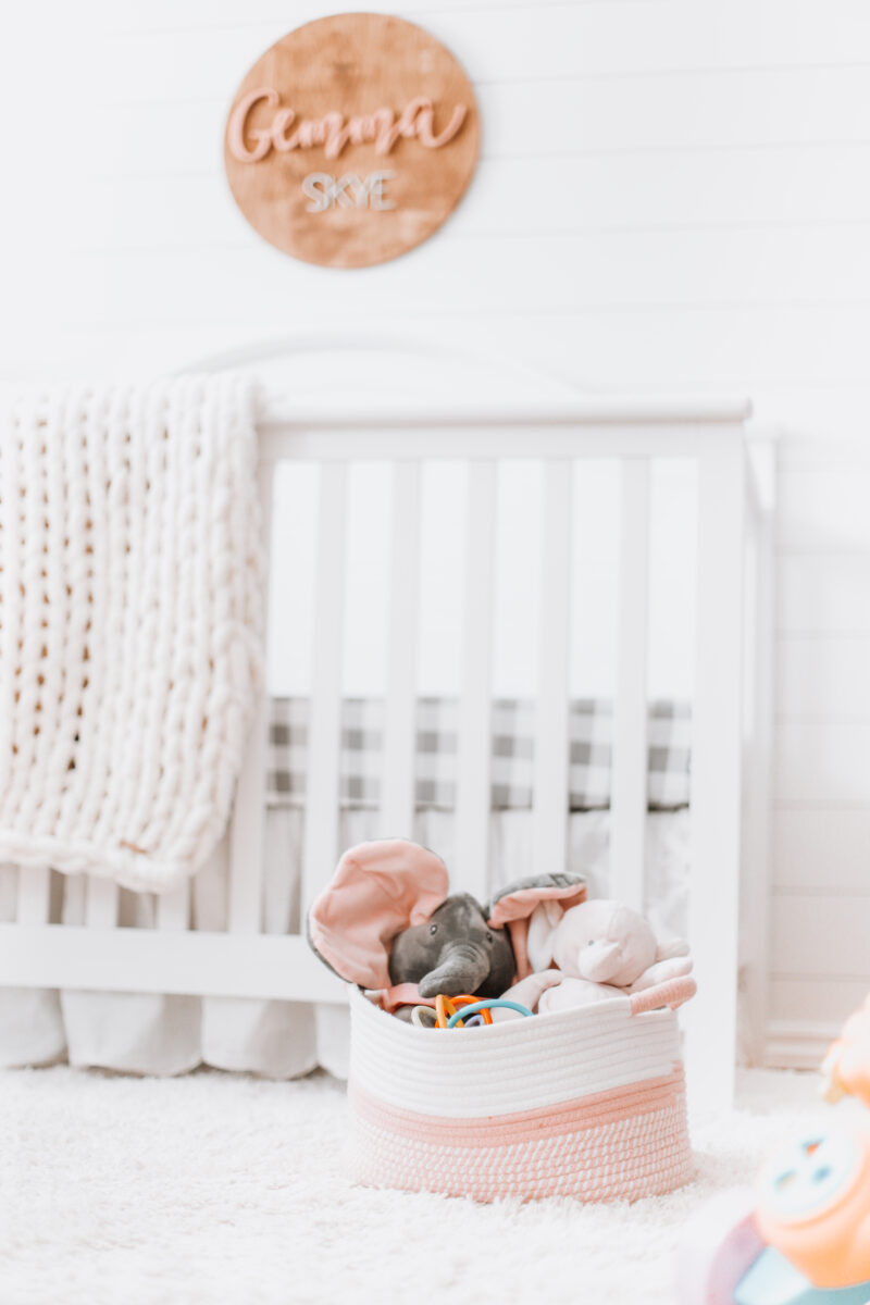 Our baby girl's nursery reveal is here! A sweet and simple modern farmhouse design with a shiplap accent wall and neutral decor. Here are all of the details! Gender Neutral | Farmhouse Nursery | Shiplap Crib | All White Nursery | Baby's Name | Wooden Sign | Chunky Knit Chenille Blanket | Home Design | Interior | Northern Living | Canadian Living | Canadian Small Shops | Small Businesses | Baby's Room |