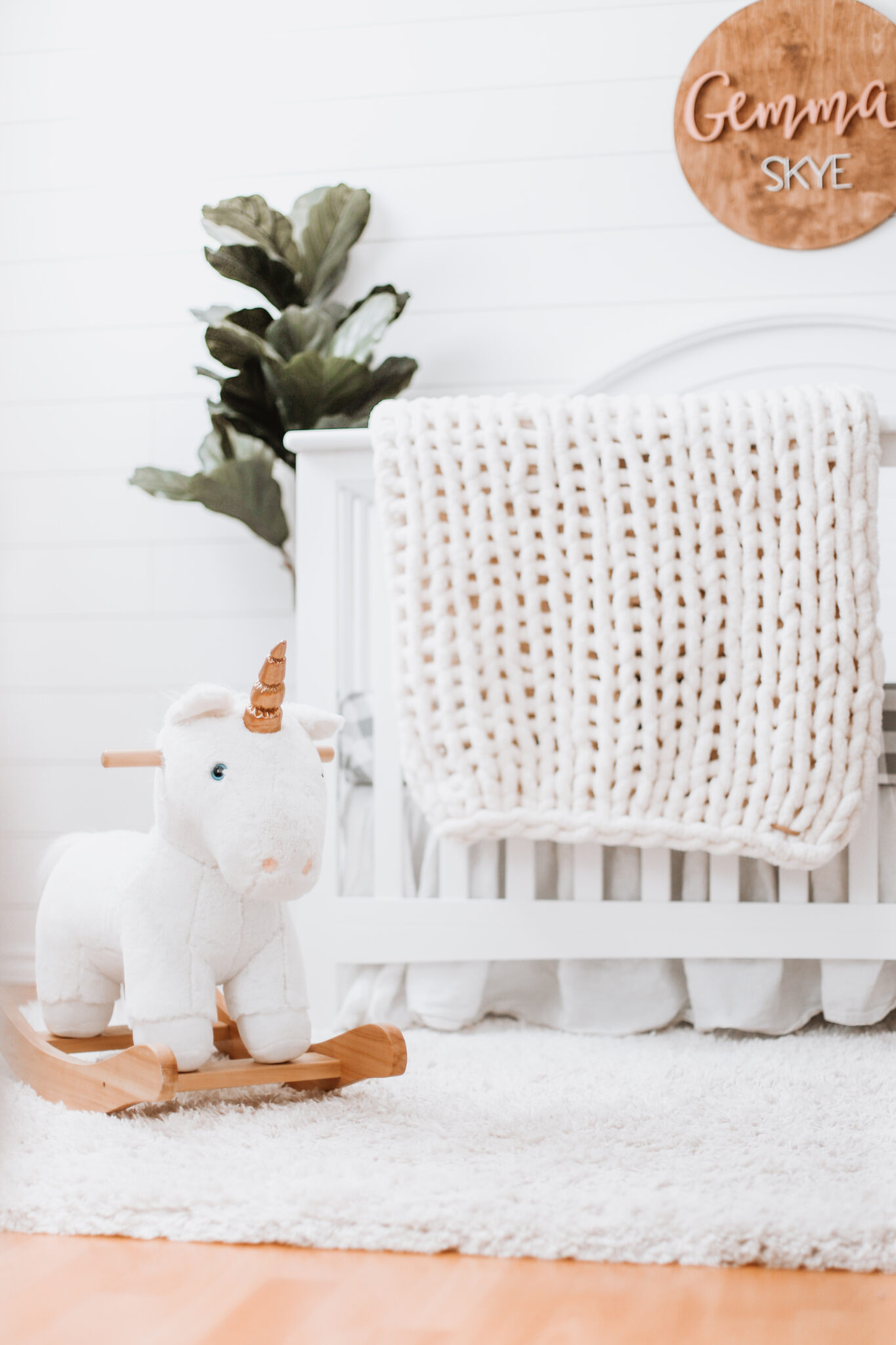 Our baby girl's nursery reveal is here! A sweet and simple modern farmhouse design with a shiplap accent wall and neutral decor. Here are all of the details! Gender Neutral | Farmhouse Nursery | Shiplap Crib | All White Nursery | Baby's Name | Wooden Sign | Chunky Knit Chenille Blanket | Home Design | Interior | Northern Living | Canadian Living | Canadian Small Shops | Small Businesses | Baby's Room |