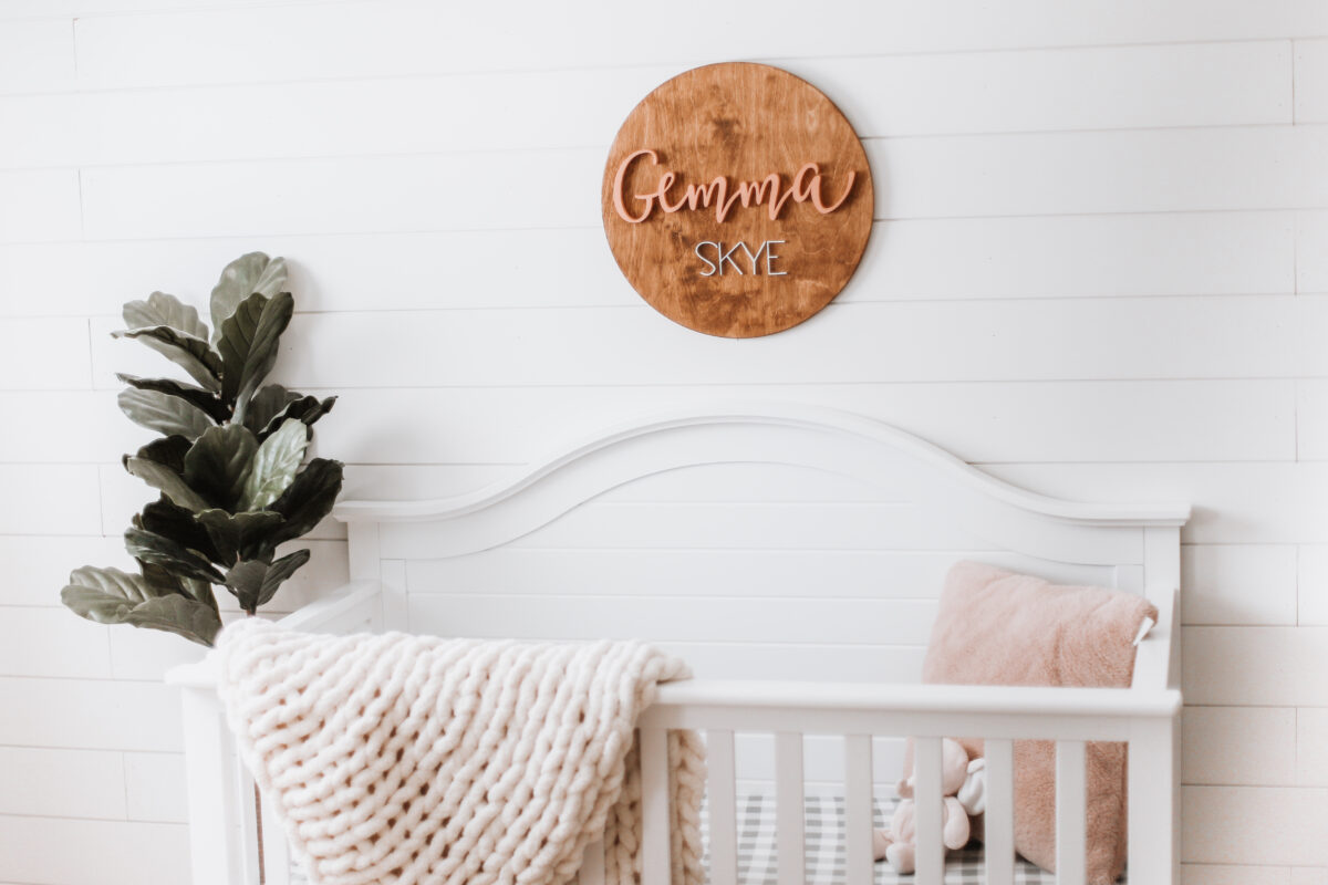 Our baby girl's nursery reveal is here! A sweet and simple modern farmhouse design with a shiplap accent wall and neutral decor. Here are all of the details! Gender Neutral | Farmhouse Nursery | Shiplap Crib | All White Nursery | Baby's Name | Wooden Sign | Chunky Knit Chenille Blanket | Home Design | Interior | Northern Living | Canadian Living | Canadian Small Shops | Small Businesses | Baby's Room |