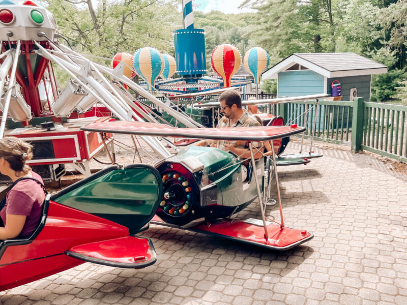 Santa's Village is an amusement park nestled in the heart of Muskoka! A family travel destination spot, for making summer memories with your kids that will last a lifetime. Bracebridge Ontario | Local Travel | Ontario Travel | Northern Ontario | Family Travel | Camping | Cottaging | Staycation | Canada | Motherhood | Parenting | Older Kids | Kids Rides | Baby Rides | Outdoor Adventures | Family Adventures | Family Activities |