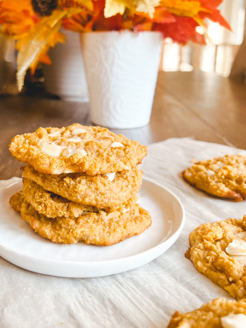 These keto pumpkin snickerdoodles are soft and chewy pumpkin spice cookies! A healthy snack or fall dessert that's gluten-free and low carb. Soft Baked Cookies | Snickerdoodle Cookies | Sugar Free | Grain Free | Ketogenic | Pumpkin Puree | White Chocolate Chips | Fall Recipe | Fall Dessert | Healthy Snacks | Pumpkin Pie Spice | Thanksgiving |