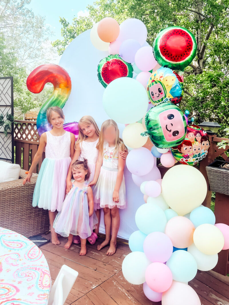 This Cocomelon themed birthday party is fun and easy to put together, perfect for any toddler. Amazon party decorations and all details here! Birthday Inso | Party Inspiration | Kids Birthday | Outdoors | Backyard Birthday Party | Patio | Deck | Home decor | Girls Birthday | Dress | Cocomelon Cake | Cookies | Display | Balloon Garland | Theme | Cotton Candy | Barbie Jeep | Ride-on Toys | Birthday Gift Idea