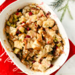 A healthy stuffing recipe that's scrumptious and flavourful and festive for the holidays -- a classic side dish for Thanksgiving or Christmas. Serve alongside turkey dinner. Easy recipes | Gluten-free bread | Homemade Stuffing | Christmas Recipe | Side Dish | Christmas Sides | Holiday Party | Gluten-Free Recipes | Holiday Dinner | Thanksgiving Recipe