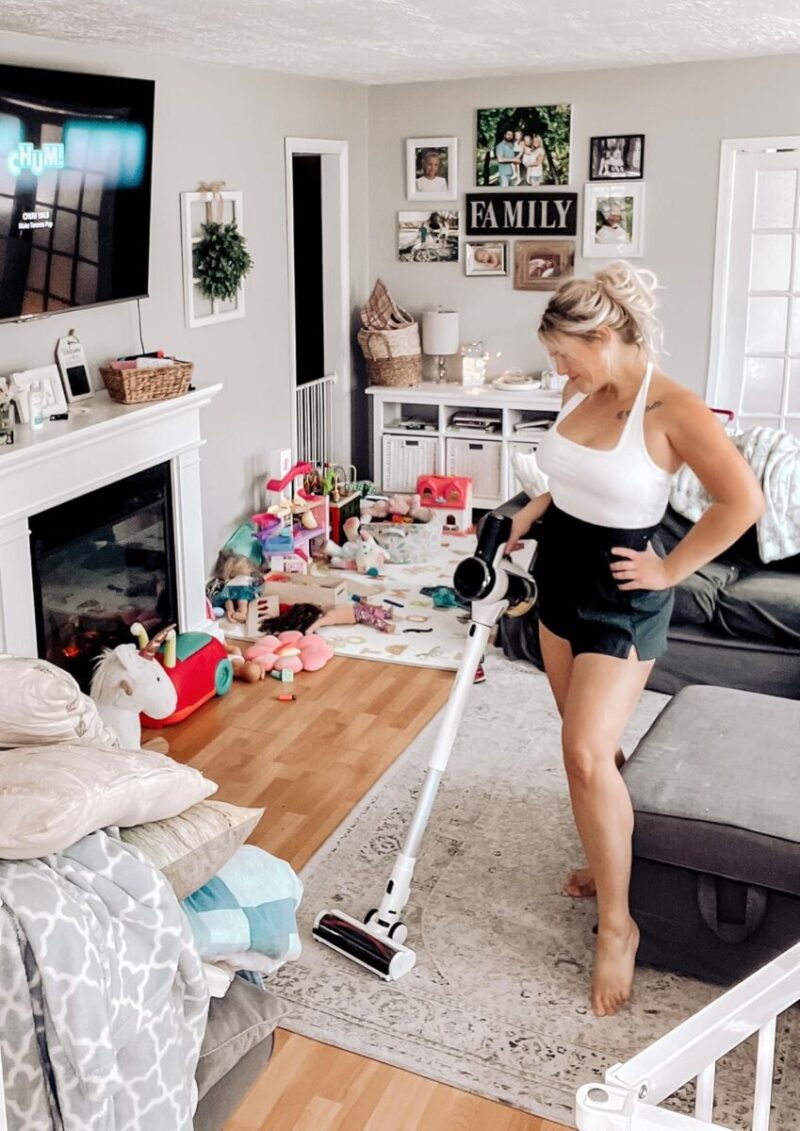 a busy mom cleaning the house with a Tineco Pure ONE S15 Pro Cordless Vacuum
