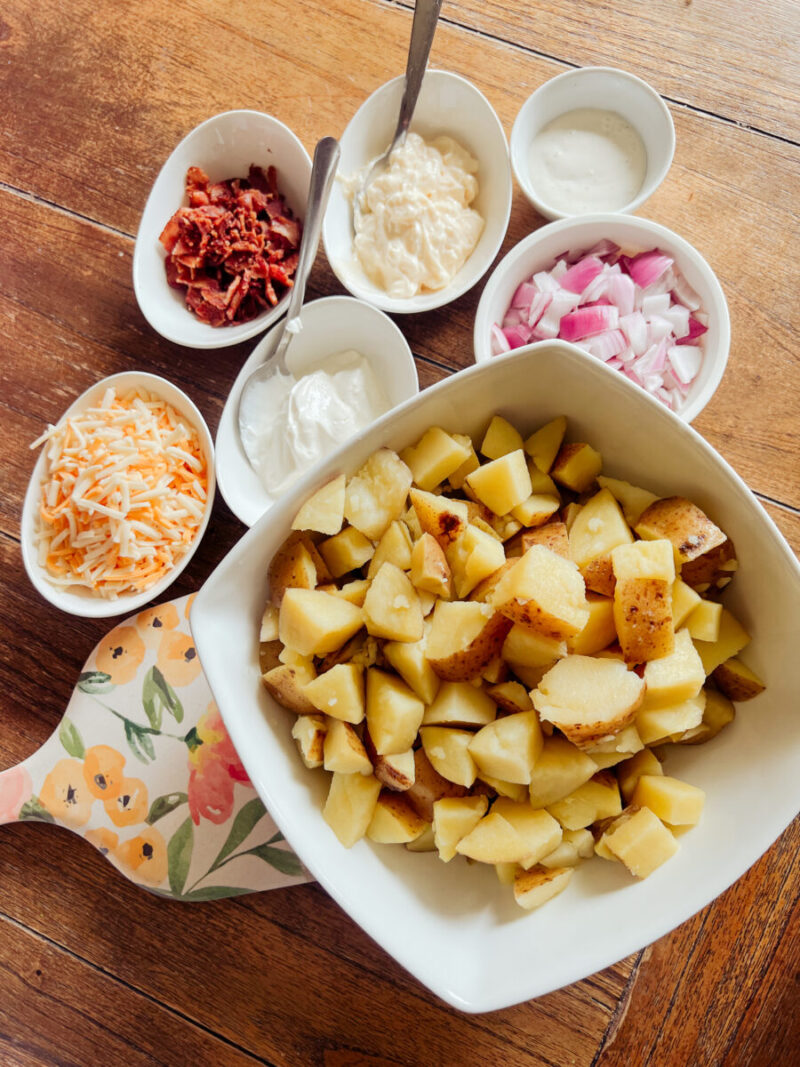 This bacon and cheddar loaded potato salad is creamy and delicious. An easy family friendly and gluten-free side dish to make for dinner. Potato Side Dishes, Dinner Sides, Potatoes, Simple Recipes, Easy Potato Recipe, Loaded Potatoes, Creamy Potato Salad Dressing, Family Dinners