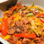 This Italian Sausage and Peppers recipe is full of flavour and an easy one pan dinner. Gluten-free, low carb, keto, paleo, and whole 30. Easy Dinners | One pot | One Pan Dinner Recipes | Main Dish | Easy Dinner Recipes | Easy and Healthy | Family Dinner | Italian Dishes | Italian Cooking | Vegetables | High Fibre | Easy Dinner