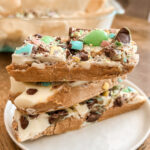 Make these mini egg peanut butter protein bars for Easter! A high protein, no bake dessert that's low in sugar and extremely satisfying! Easter treats | Easter Desserts | mini eggs recipe | low carb | healthier desserts | healthy recipes | white chocolate and peanut butter