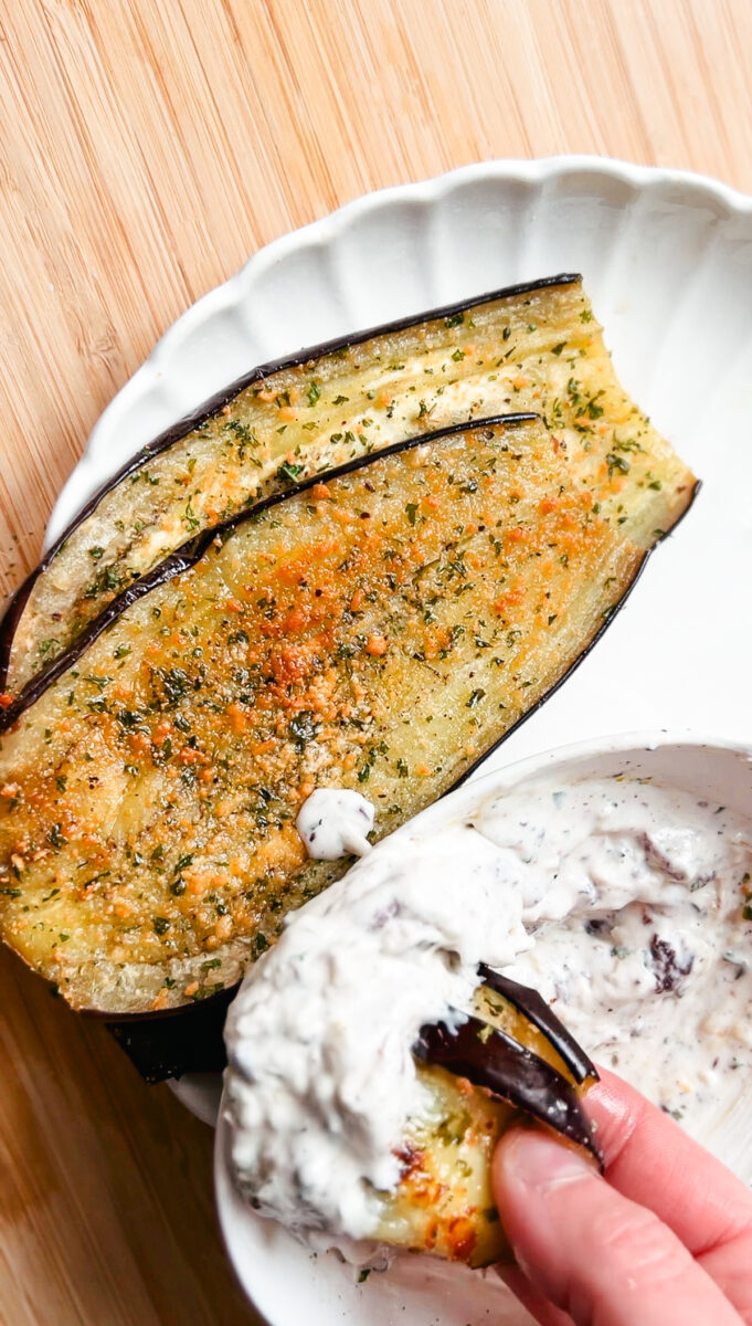 This Oven Roasted Eggplant with garlic and parmesan is baked to perfection and served with a Mediterranean dip. Delicious, healthy, and a quick and easy dinner or side dish that's gluten-free, low carb and keto friendly. Dinner Recipes | Dinner Side Dish | Greek Recipes | Italian Recipes | Eggplant Recipe | Oven Baked | Homemade Dip | Appetizer | Healthy Meals | Easy Dinners