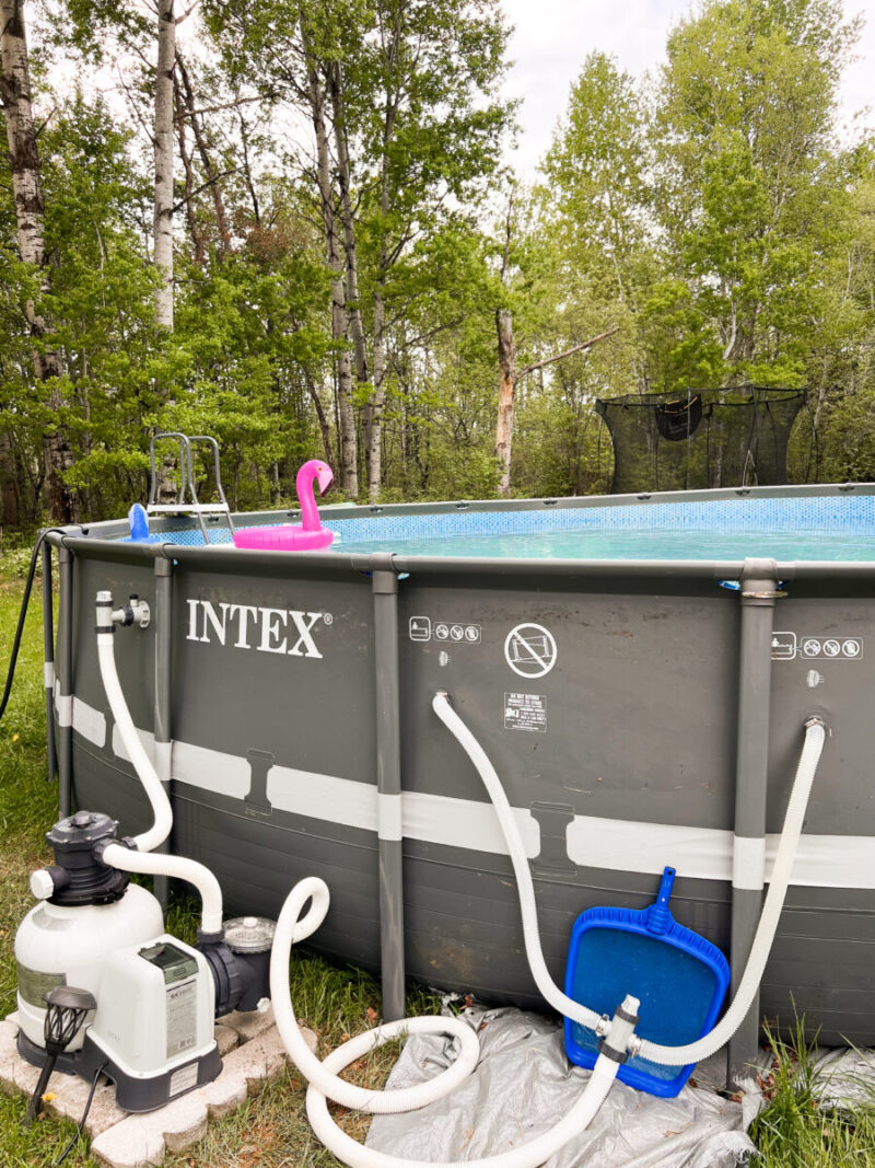 Close-up of the Intex Ultra XTR sand filter system and galvanized steel frame