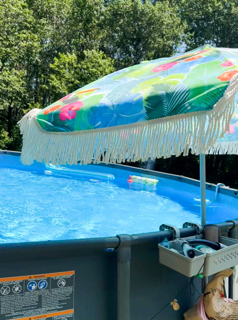 Beach umbrella attached to our 24ft Intex Ultra XTR above ground pool